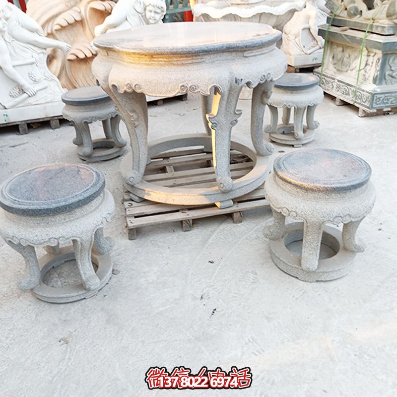 古典風情石材庭院環(huán)形石桌石凳套裝 古典風情石材庭院環(huán)形石桌石凳套裝